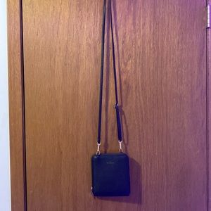 A mini bag it has long straps adjustable